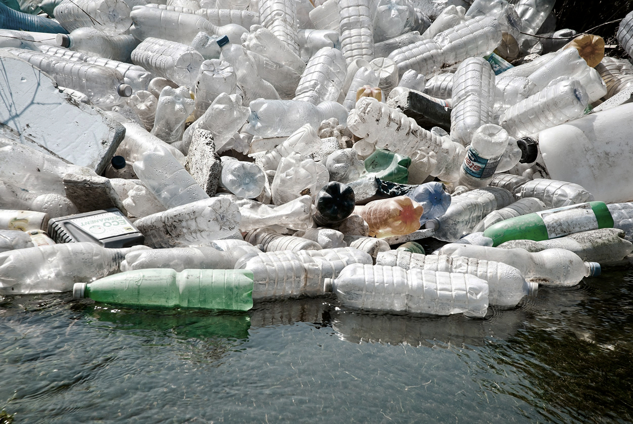 14485297 - river waters polluted by plastic garbage